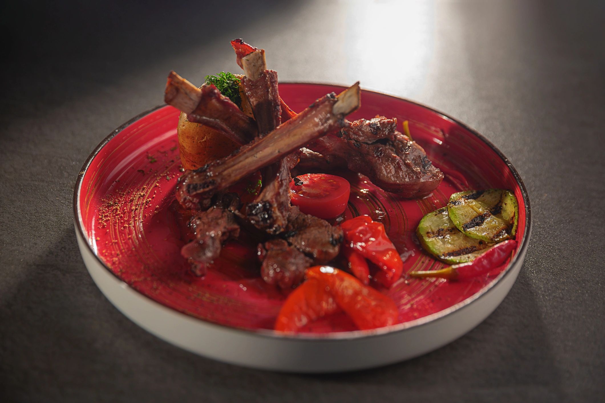 Grilled lamb chops with roasted vegetables